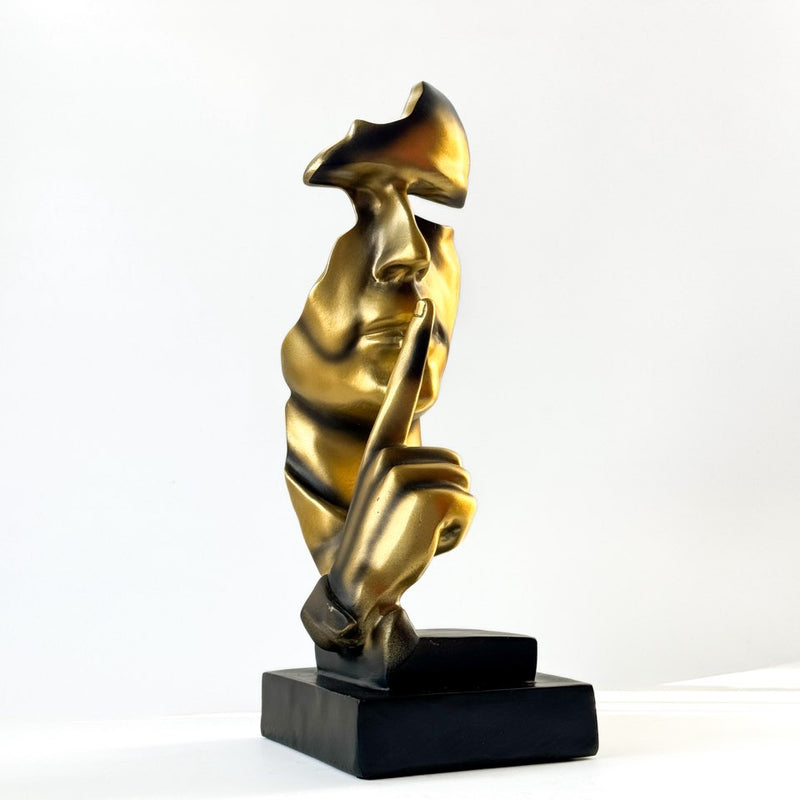 Golden mask statue