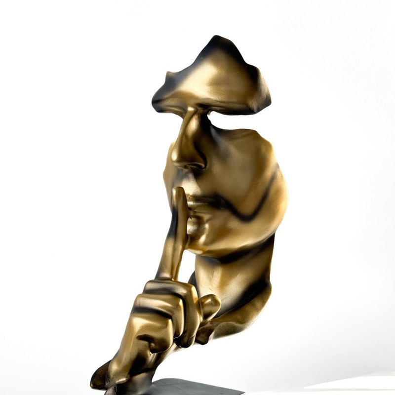 Gold mask statue